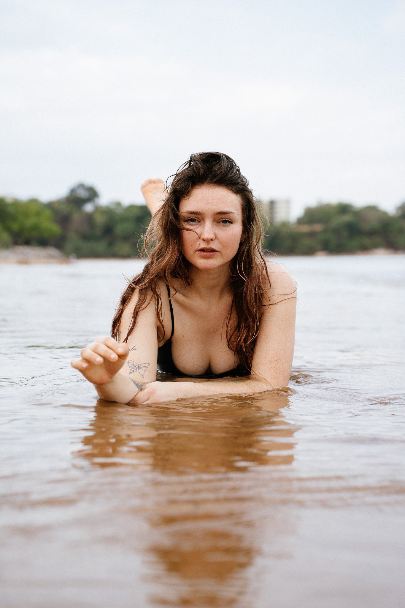 One-piece swimwear styled for an outdoor intimate portrait photoshoot